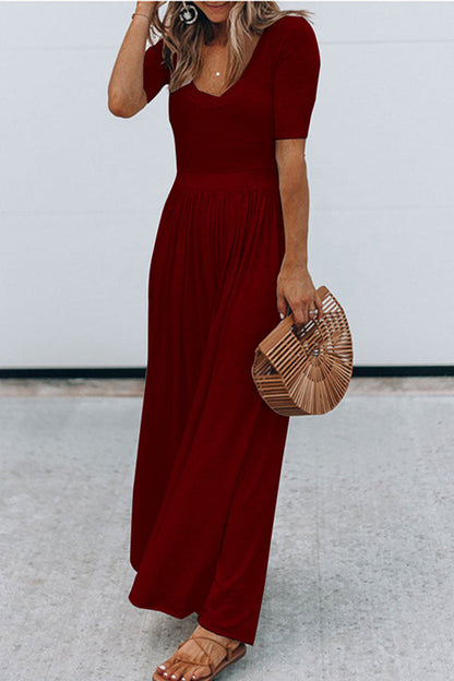 Jumpsuit met ronde hals, vleugelmouwen en hoge taille