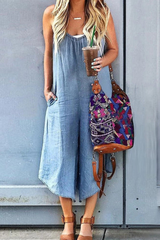 Mouwloze denim jumpsuit met V-hals en wijde pijpen