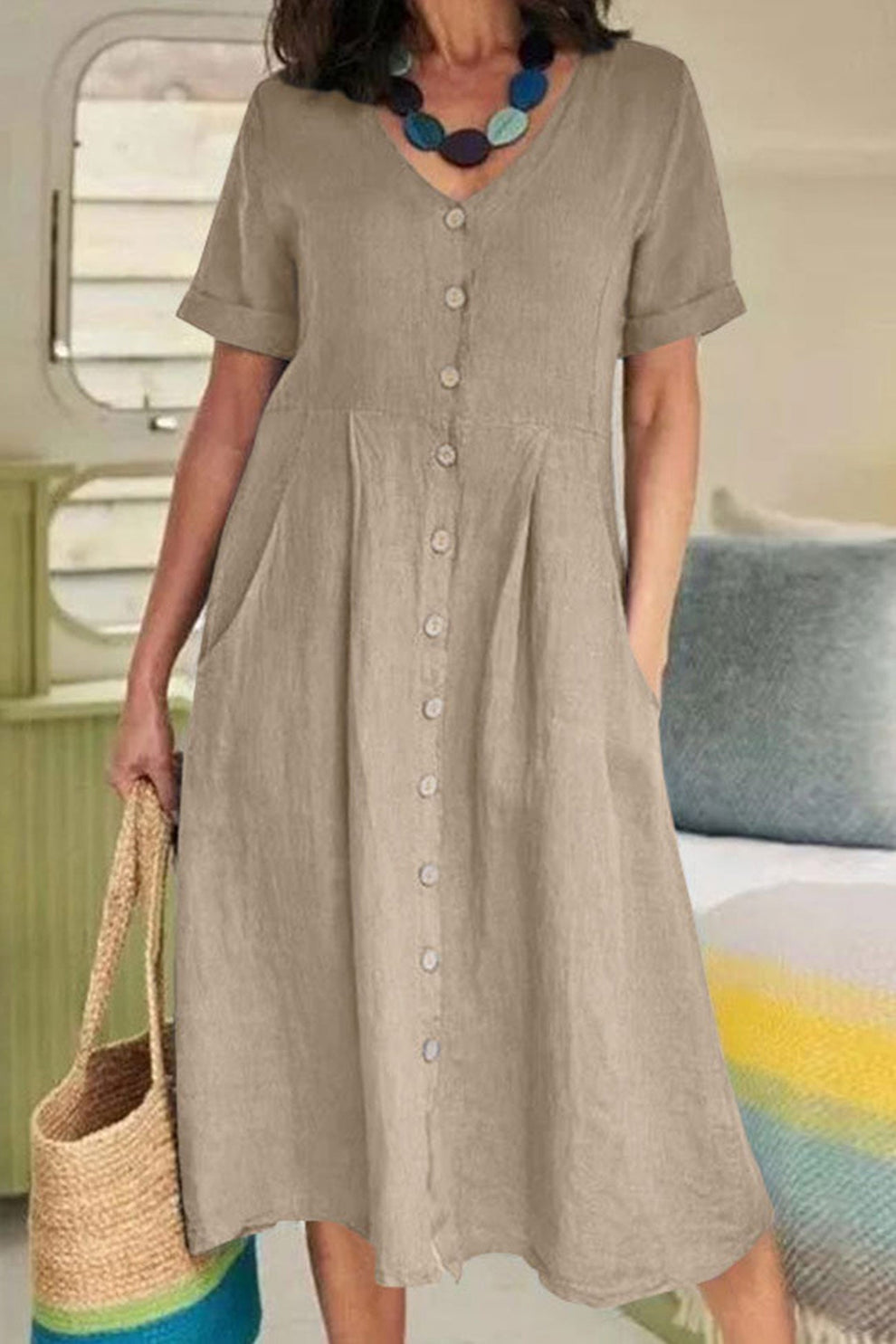 Licht midi-jurkje met korte mouwen en knoopsluiting in T-shirtstijl