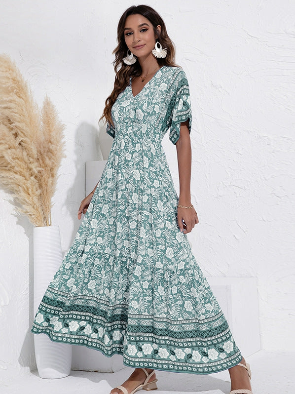 Modieuze swingjurk met hoge taille en V-hals